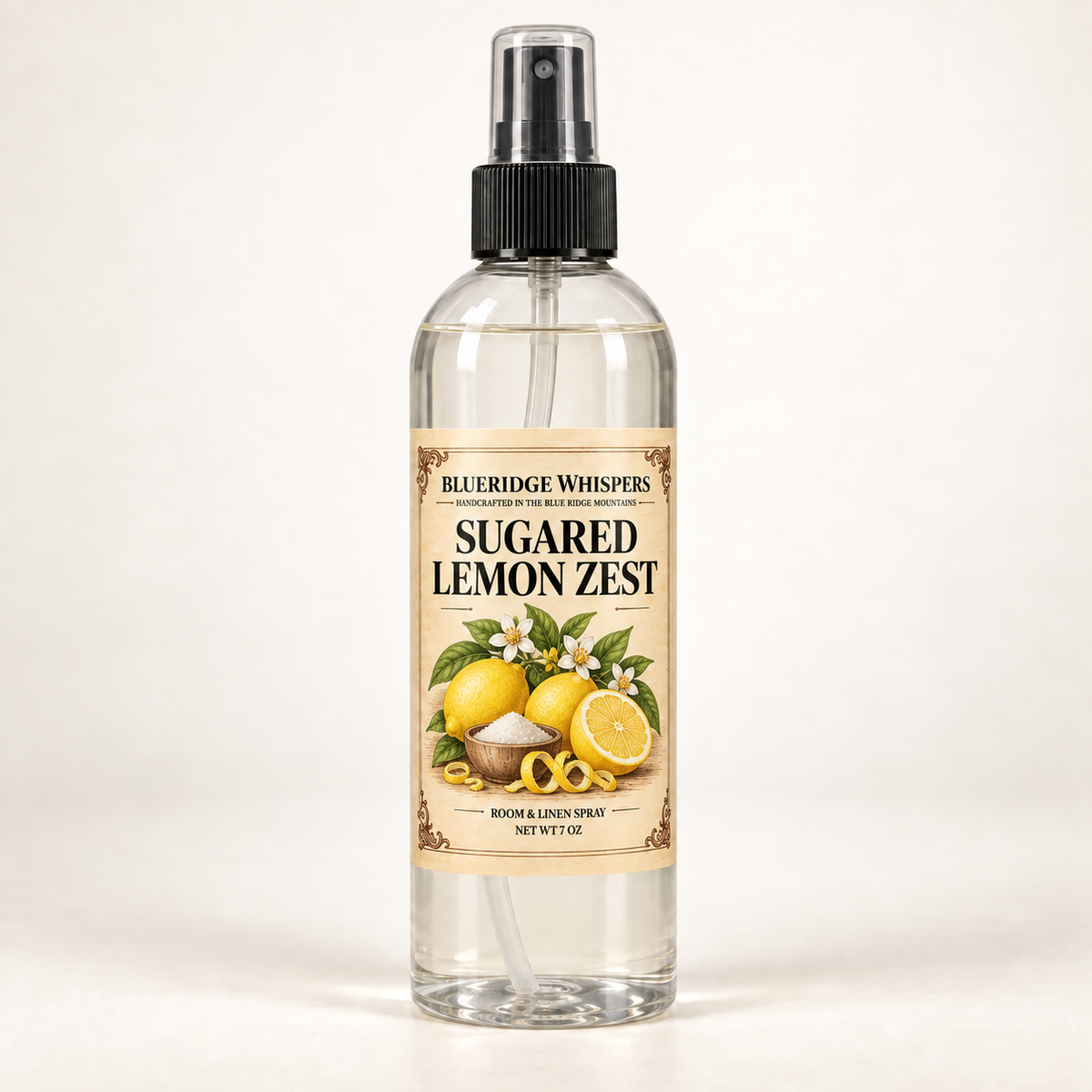 Sugared Lemon Zest room and fabric spray by BlueRidge Whispers, net weight 7 oz, with a lemon and sugar parchment label, clear bottle, and black fine-mist sprayer.