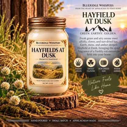 Hayfield at Dusk – Fresh Hay Coco-Soy Candle with its existing label and scent accents against the Blue Ridge Mountains.