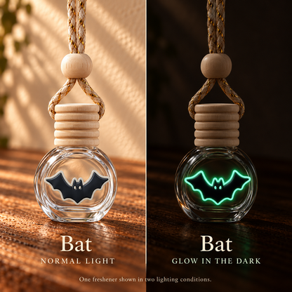 Bat Halloween car freshener shown in normal light and glowing in the dark; two views of one freshener.