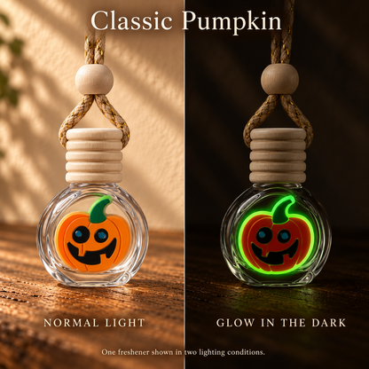 Classic Pumpkin Halloween car freshener shown in normal light and glowing in the dark; two views of one freshener.