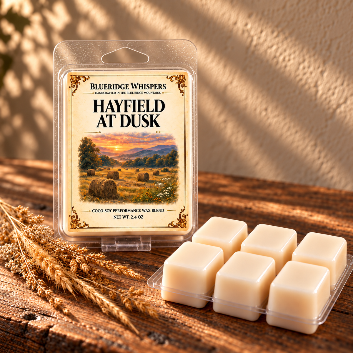 Hayfield at Dusk – Hand Poured Soy Wax Melts on a dark rustic wooden table with scent accents in warm natural light.