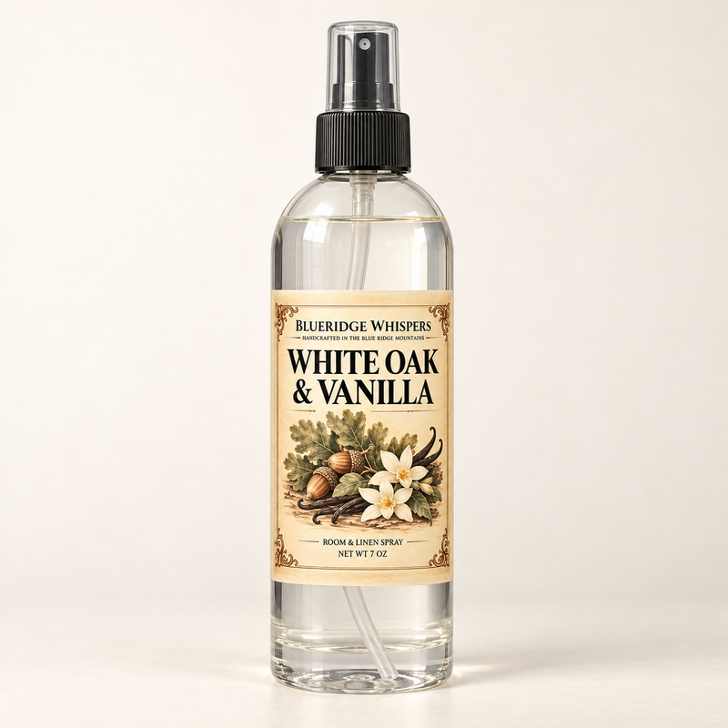 White Oak & Vanilla room and fabric spray by BlueRidge Whispers, net weight 7 oz, clear bottle with black fine-mist sprayer and parchment label.